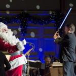 Boston Pops conductor Keith Lockhart led the orchestra with a light saber at Friday?s concert.